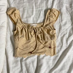 coquette baige crop top, size smalll, can be worn off the shoulders.